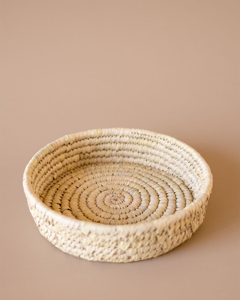 Round handmade  wicker woven natural storage basket by Kolus Home